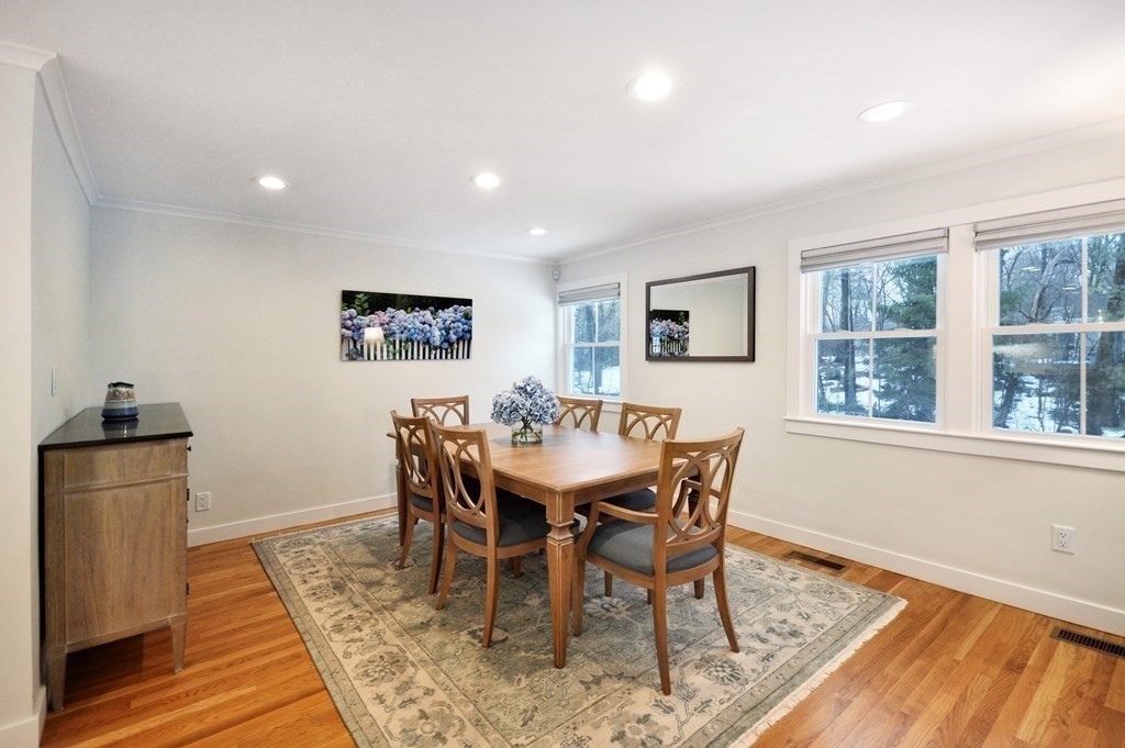 34 Fairbanks Road Lexington, MA 02421 - Photo 12 of 41 a view of a dining room with furniture a rug and wooden floor