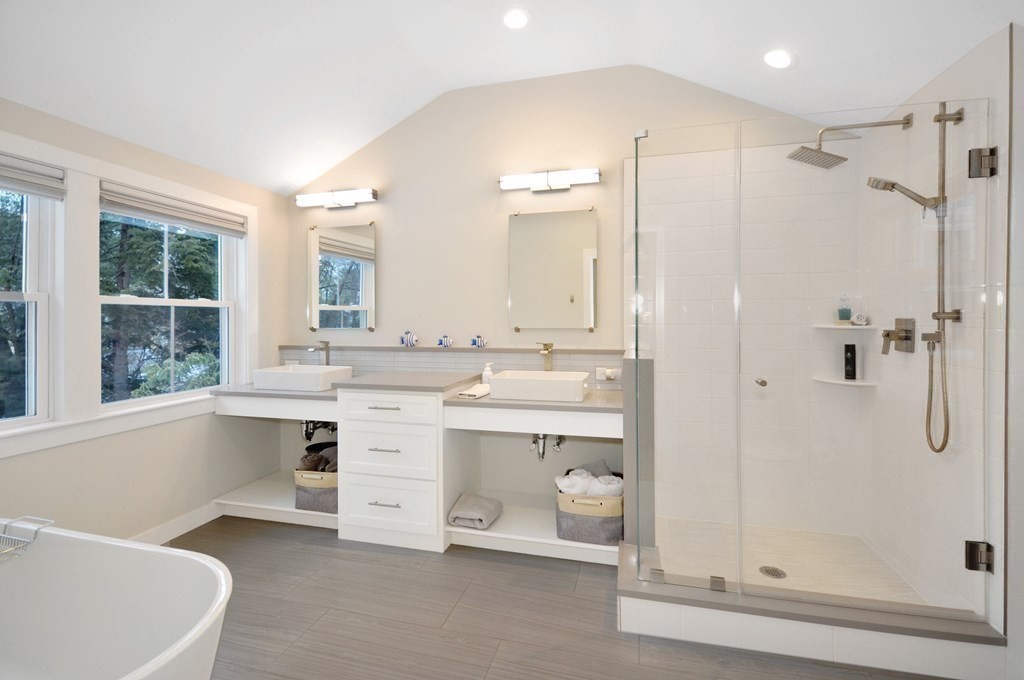 34 Fairbanks Road Lexington, MA 02421 - Photo 29 of 41 a bathroom with a tub sink shower and mirror