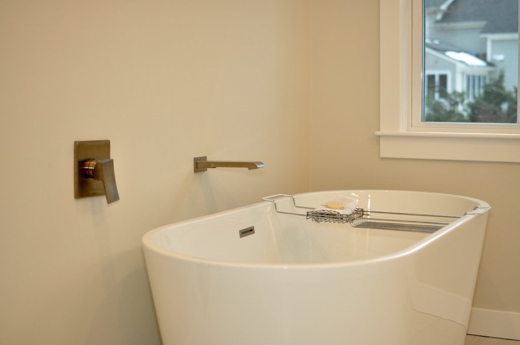 34 Fairbanks Road Lexington, MA 02421 - Photo 31 of 41 a white bath tub sitting next to a window
