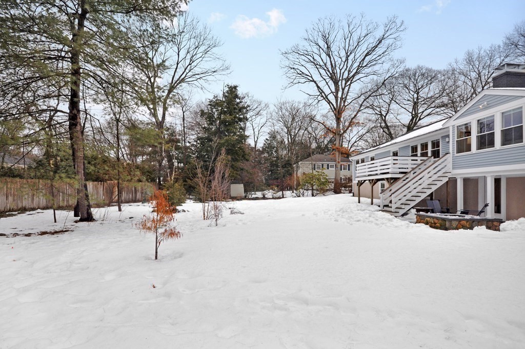 34 Fairbanks Road Lexington, MA 02421 - Photo 41 of 41 a street view covered with snow and trees