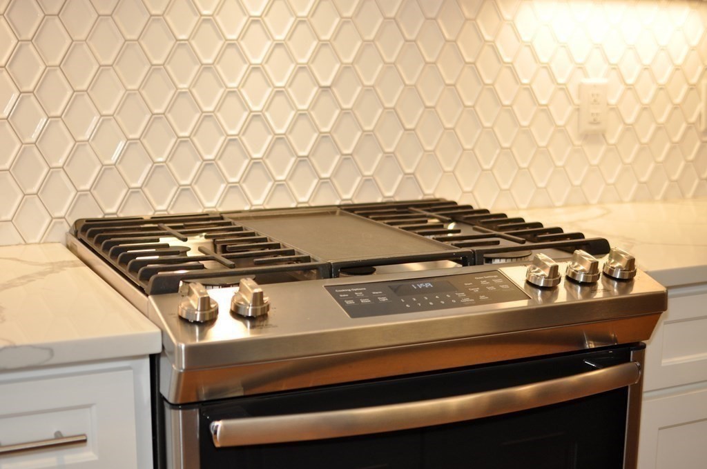 34 Fairbanks Road Lexington, MA 02421 - Photo 8 of 41 a close view of stove