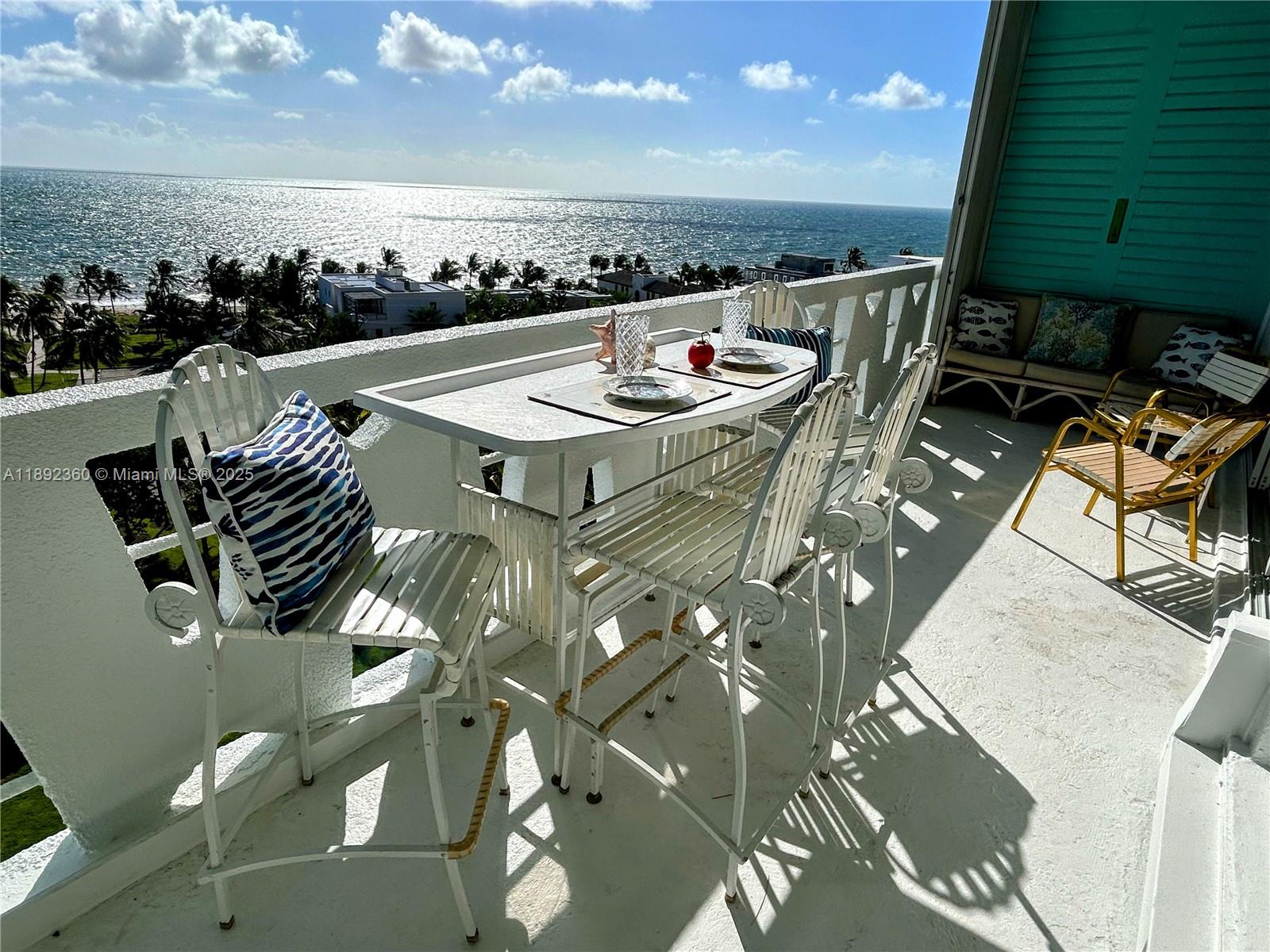 2840 North Ocean Boulevard, Unit 1008 Fort Lauderdale, FL 33308 - Photo 1 of 25 a view of a terrace with furniture and a potted plant