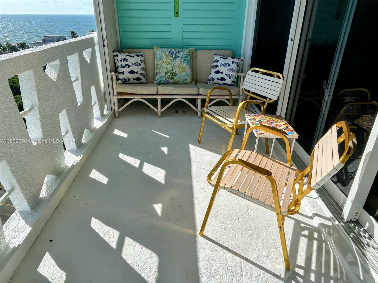 2840 North Ocean Boulevard, Unit 1008 Fort Lauderdale, FL 33308 - Photo 16 of 25 a view of a chairs in balcony