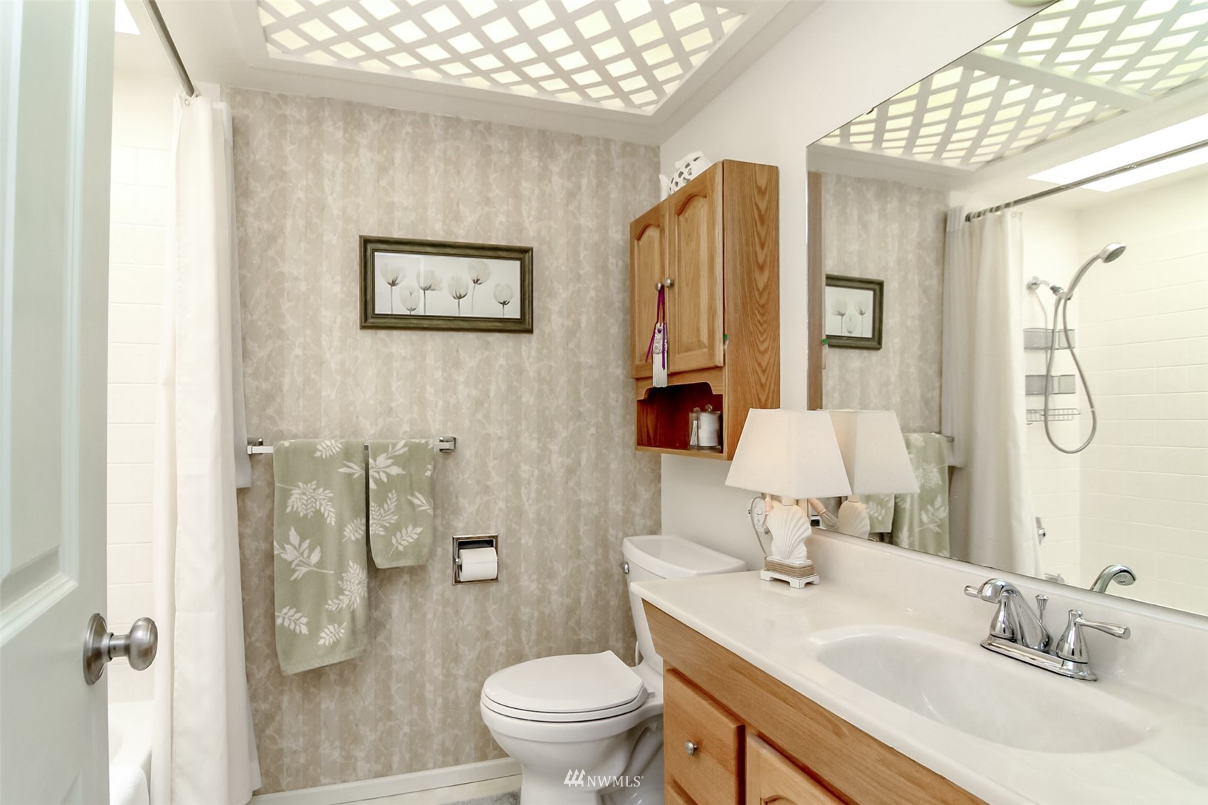 15007 Southeast 145th Place Renton, WA 98059 - Photo 17 of 34 a bathroom with a sink toilet and shower