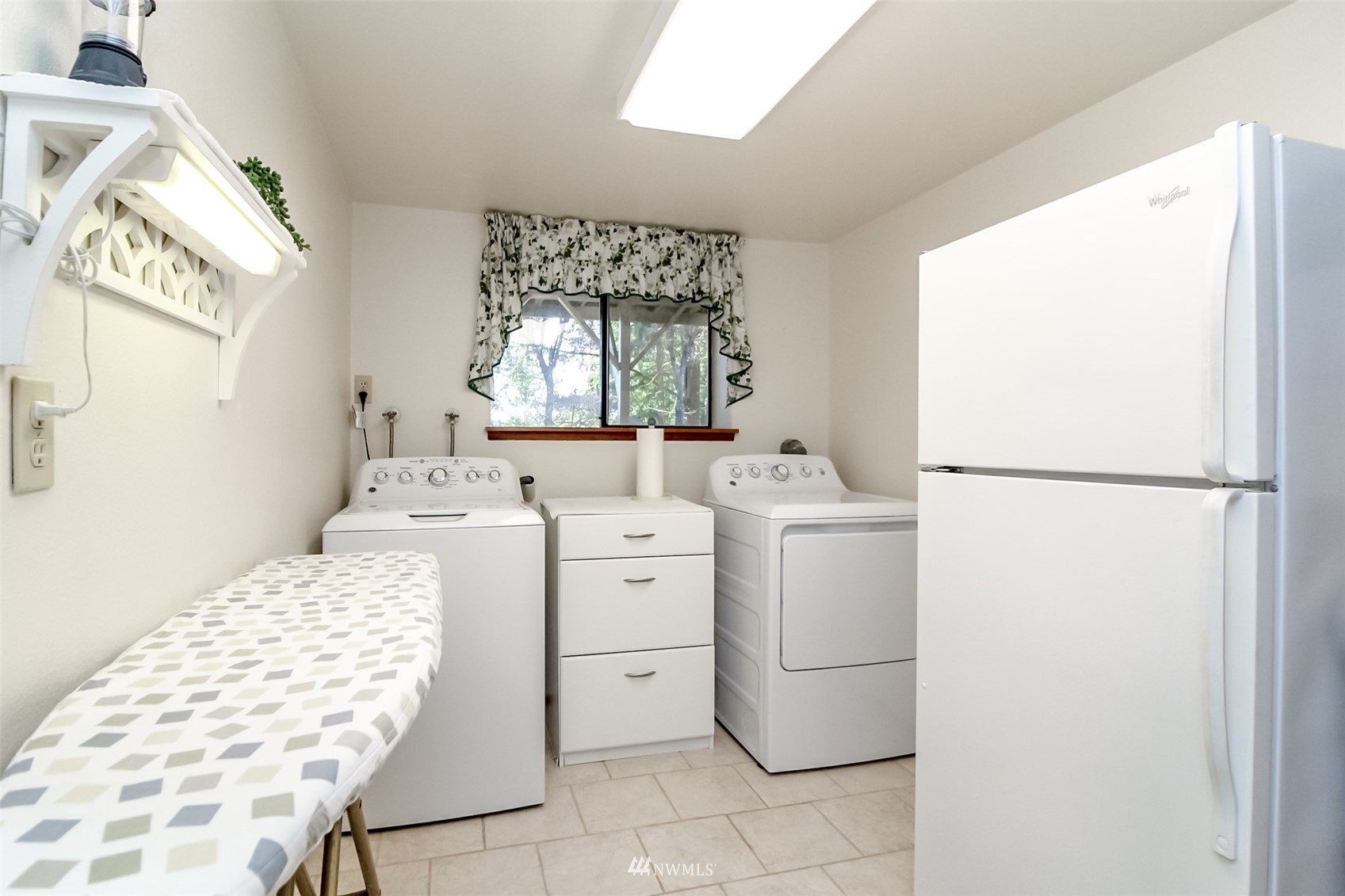 15007 Southeast 145th Place Renton, WA 98059 - Photo 23 of 34 a utility room with dryer and washer
