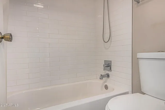 a view of a balcony with chairs