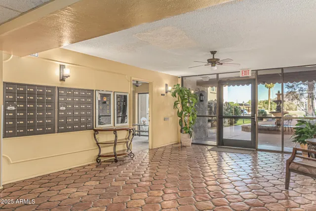 a living room with furniture a dining table and a stove top oven
