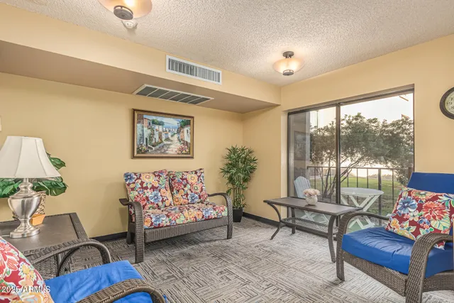 a view of a bathroom with a glass door