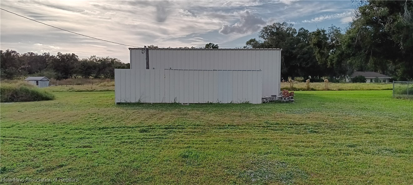 715 Stenstrom Road Wauchula, FL 33873 - Photo 5 of 11 a view of a backyard