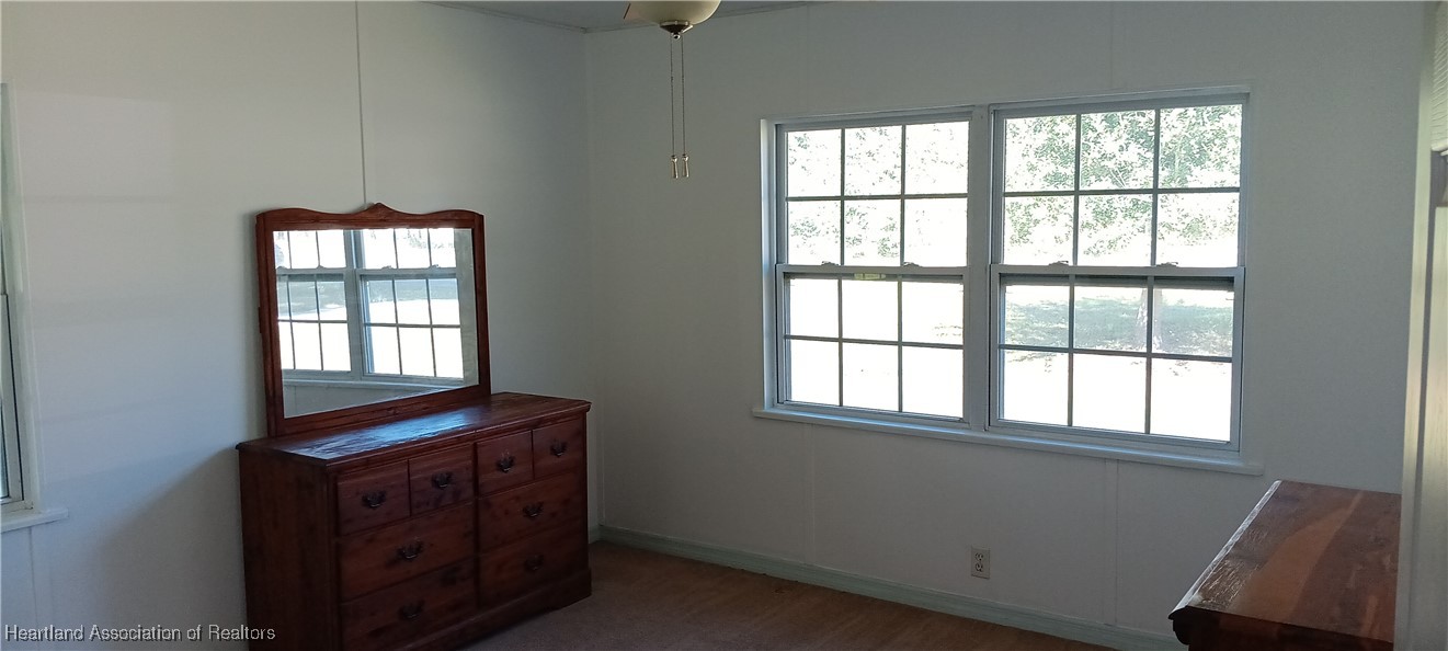 715 Stenstrom Road Wauchula, FL 33873 - Photo 7 of 11 a view of an empty room with a window