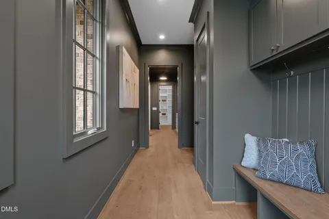 a bathroom with a sink double vanity and a mirror