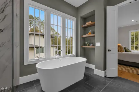 a kitchen with white cabinets