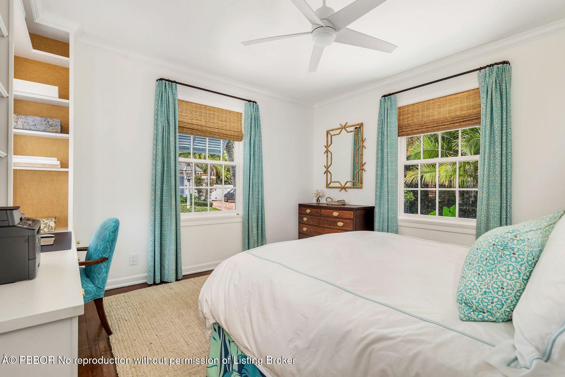 255 Colonial Lane Palm Beach, FL 33480 - Photo 13 of 32 a bedroom with a bed and wooden floor