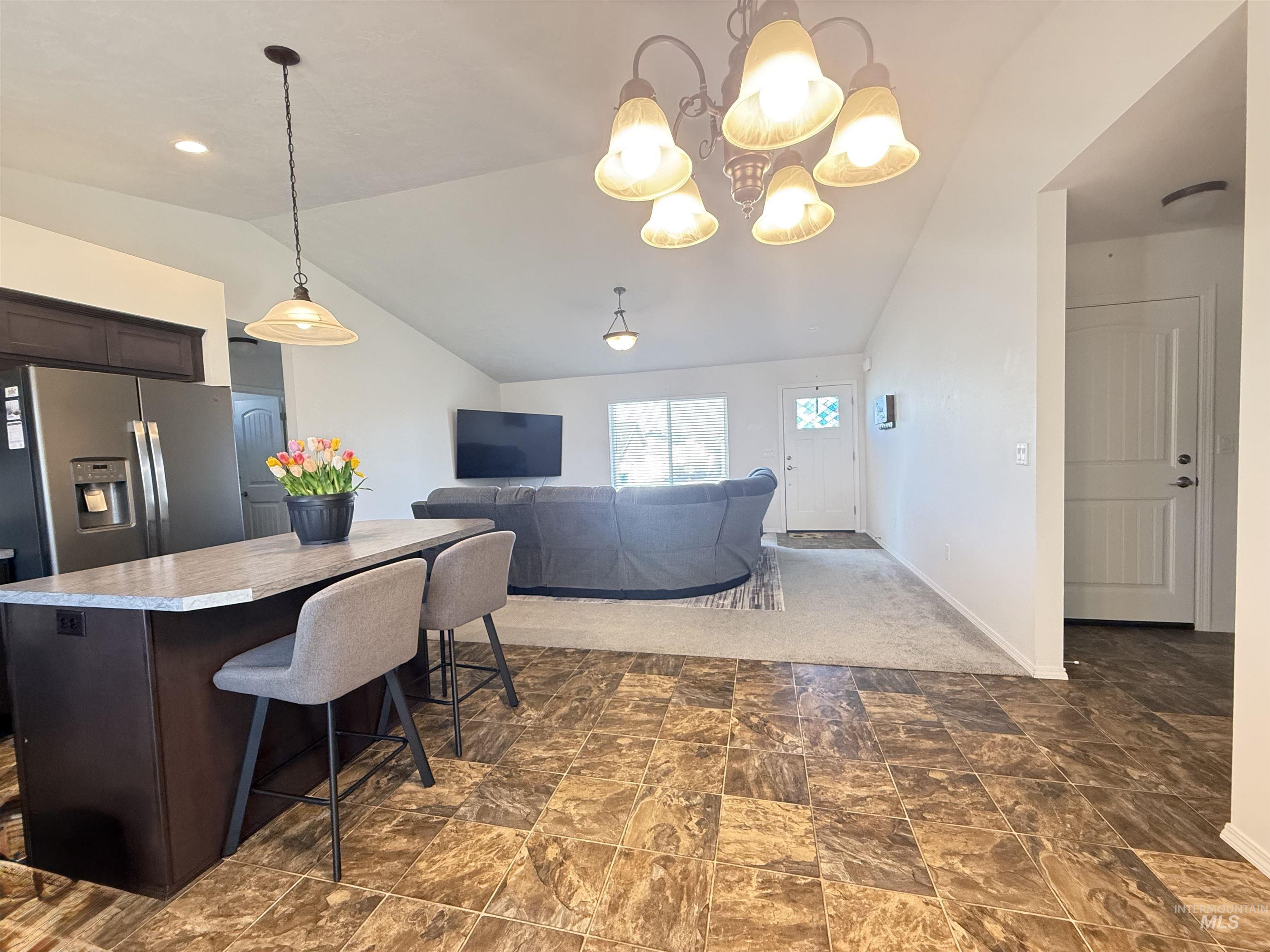 1556 Frontier Drive Lewiston, ID 83501 - Photo 21 of 23 Open-concept living area with vaulted ceilings