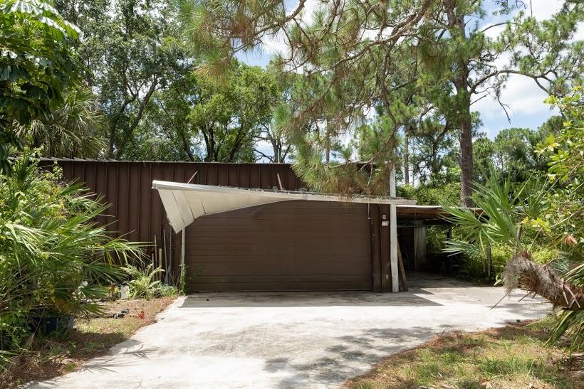 7169 Southeast Rivers Edge Street Jupiter, FL 33458 - Photo 33 of 39 a view of a garage