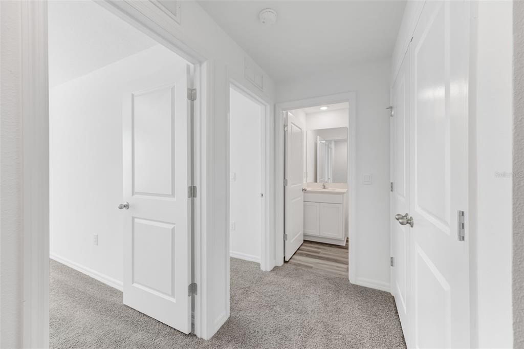 1011 Spotted Egret Loop Ruskin, FL 33570 - Photo 20 of 33 a view of a livingroom and a bathroom
