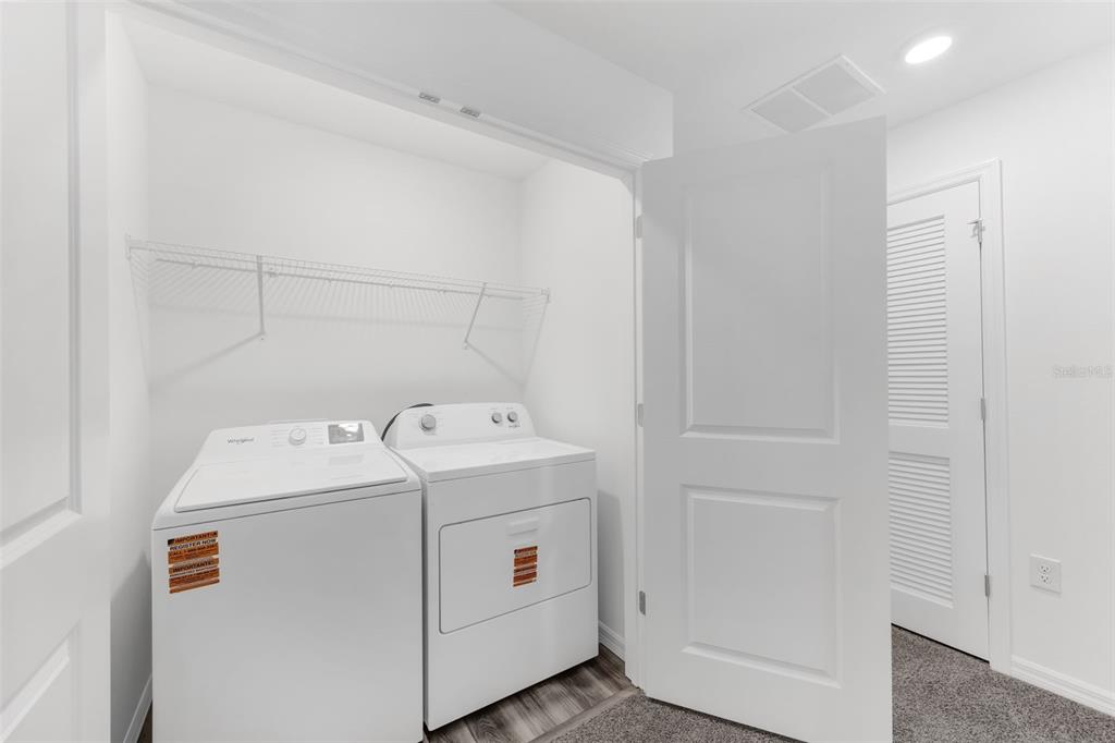 1011 Spotted Egret Loop Ruskin, FL 33570 - Photo 21 of 33 a utility room with dryer and washer