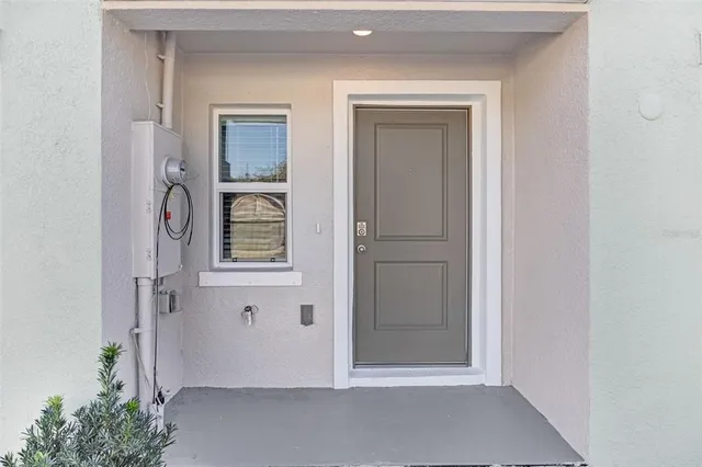 a view of a bathroom with a sink wooden floor and staircase