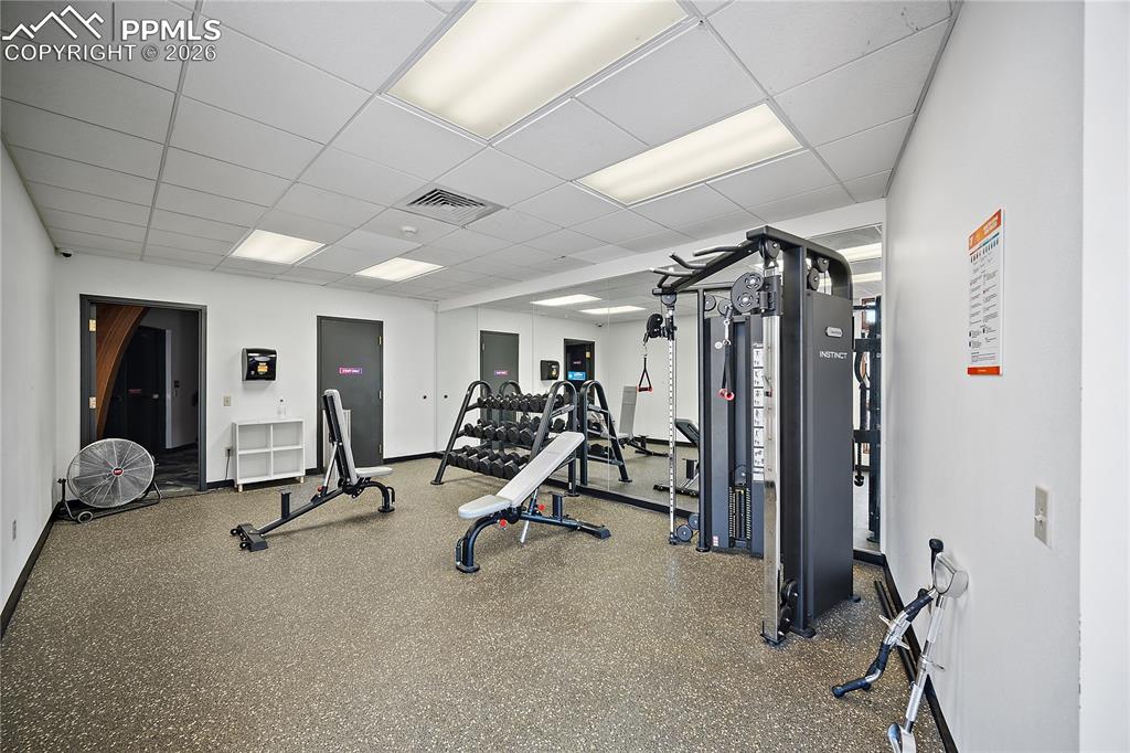 4295 Samaritan Loop Colorado Springs, CO 80916 - Photo 39 of 50 a view of a room with gym equipment