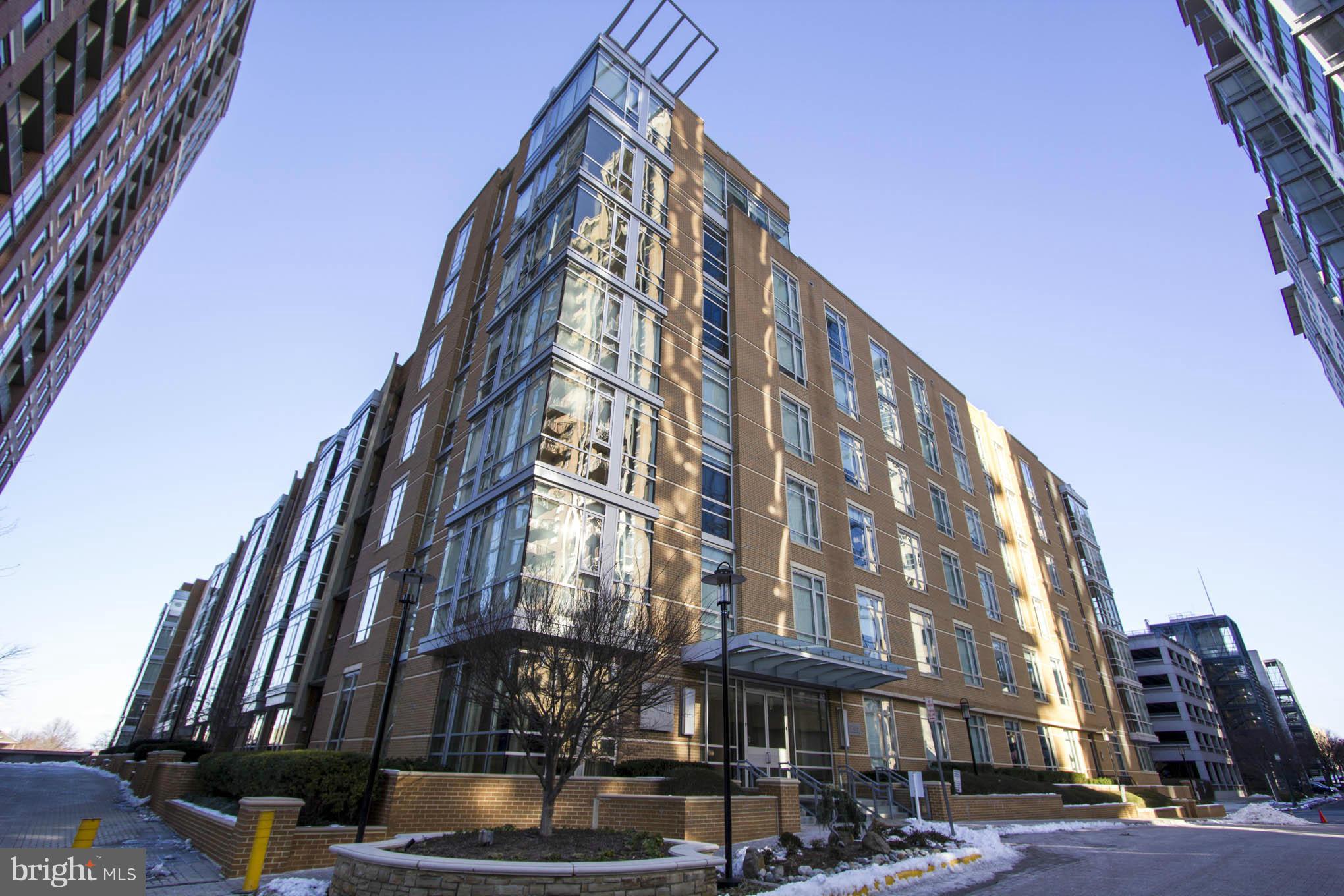 12025 New Dominion Parkway, Unit LL103 Reston, VA 20190 - Photo 1 of 30 a view of a tall building