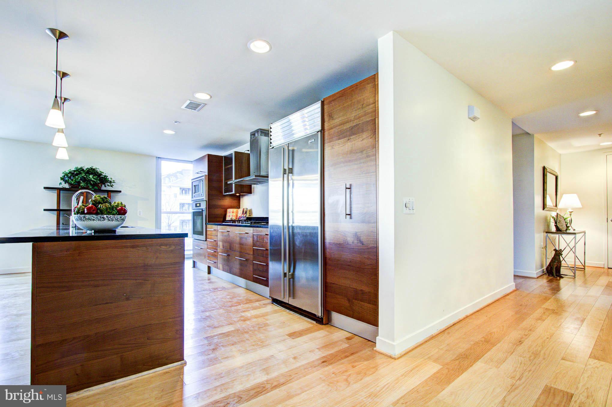 12025 New Dominion Parkway, Unit LL103 Reston, VA 20190 - Photo 13 of 30 a view interior of a house and wooden floor