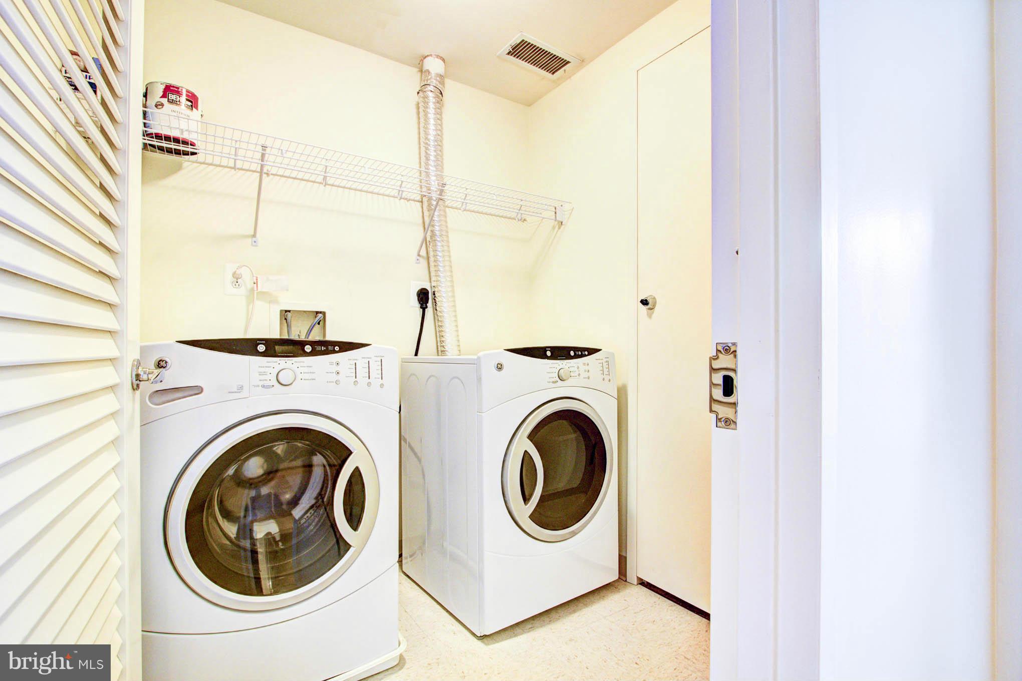 12025 New Dominion Parkway, Unit LL103 Reston, VA 20190 - Photo 5 of 30 a utility room with dryer and washer
