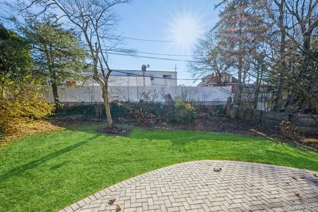 a view of a back yard of the house