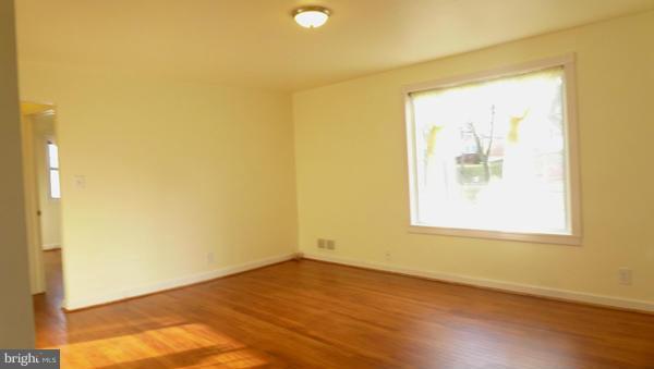 12311 Goodhill Road Silver Spring, MD 20902 - Photo 2 of 20 an empty room with a window