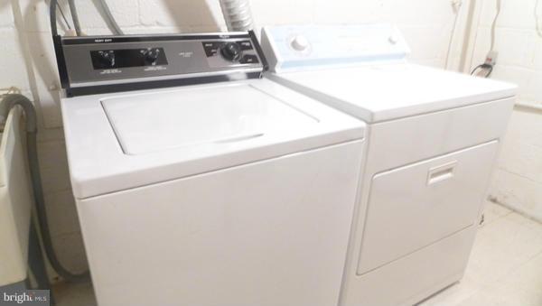 12311 Goodhill Road Silver Spring, MD 20902 - Photo 12 of 20 a close up view of washer and dryer