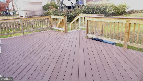 12311 Goodhill Road Silver Spring, MD 20902 - Photo 15 of 20 a view of deck with wooden floor and fence