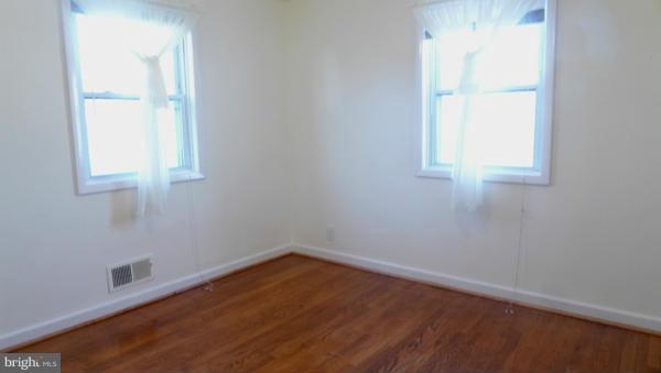 12311 Goodhill Road Silver Spring, MD 20902 - Photo 4 of 20 an empty room with a window