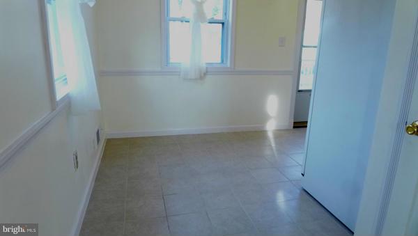12311 Goodhill Road Silver Spring, MD 20902 - Photo 7 of 20 view of a room with door