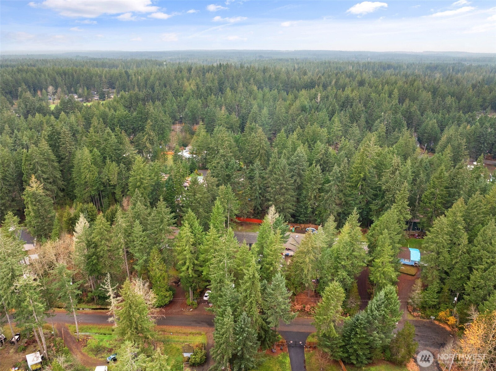 71 East Dunvegan Road Shelton, WA 98584 - Photo 20 of 21 a view of a lake with a city