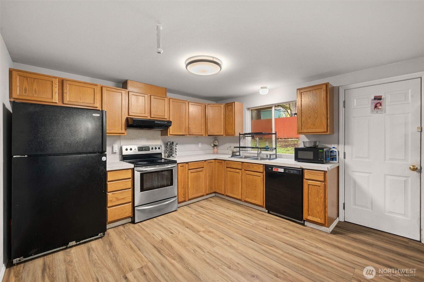 71 East Dunvegan Road Shelton, WA 98584 - Photo 4 of 21 a kitchen with stainless steel appliances granite countertop a refrigerator stove top oven and sink