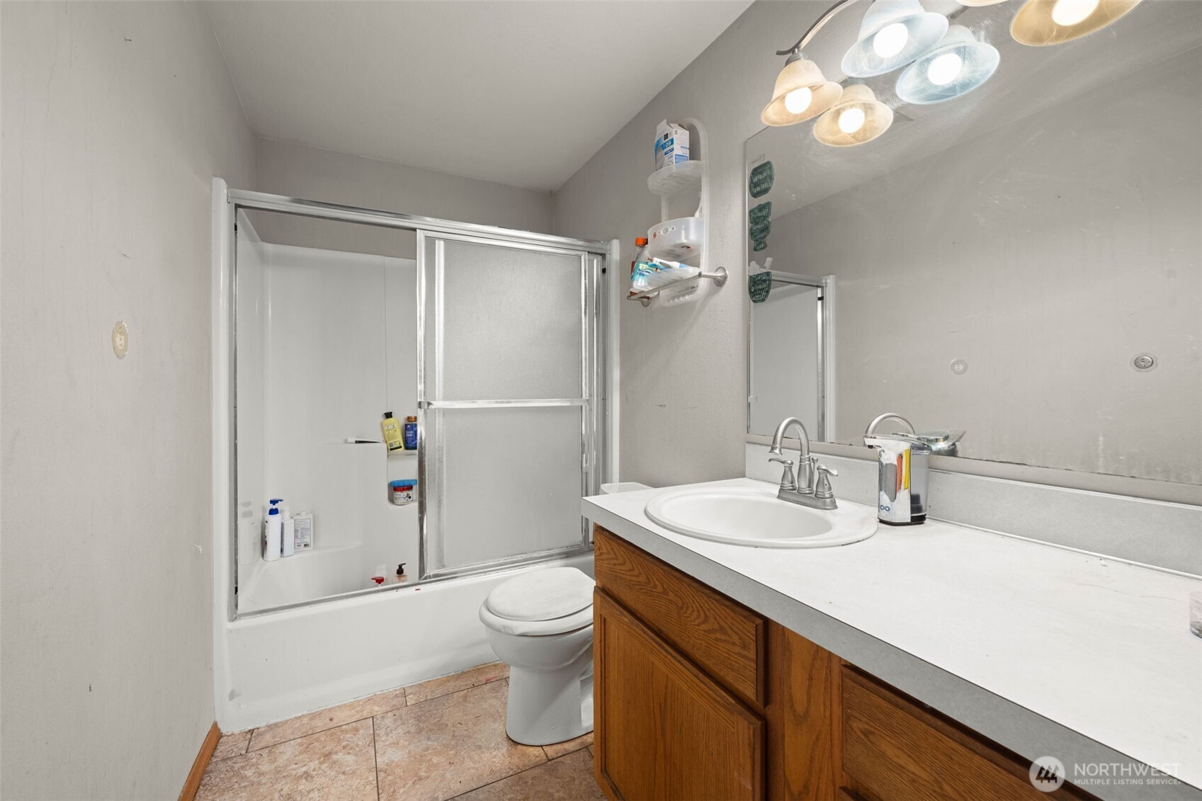 71 East Dunvegan Road Shelton, WA 98584 - Photo 9 of 21 a bathroom with a sink a toilet and shower