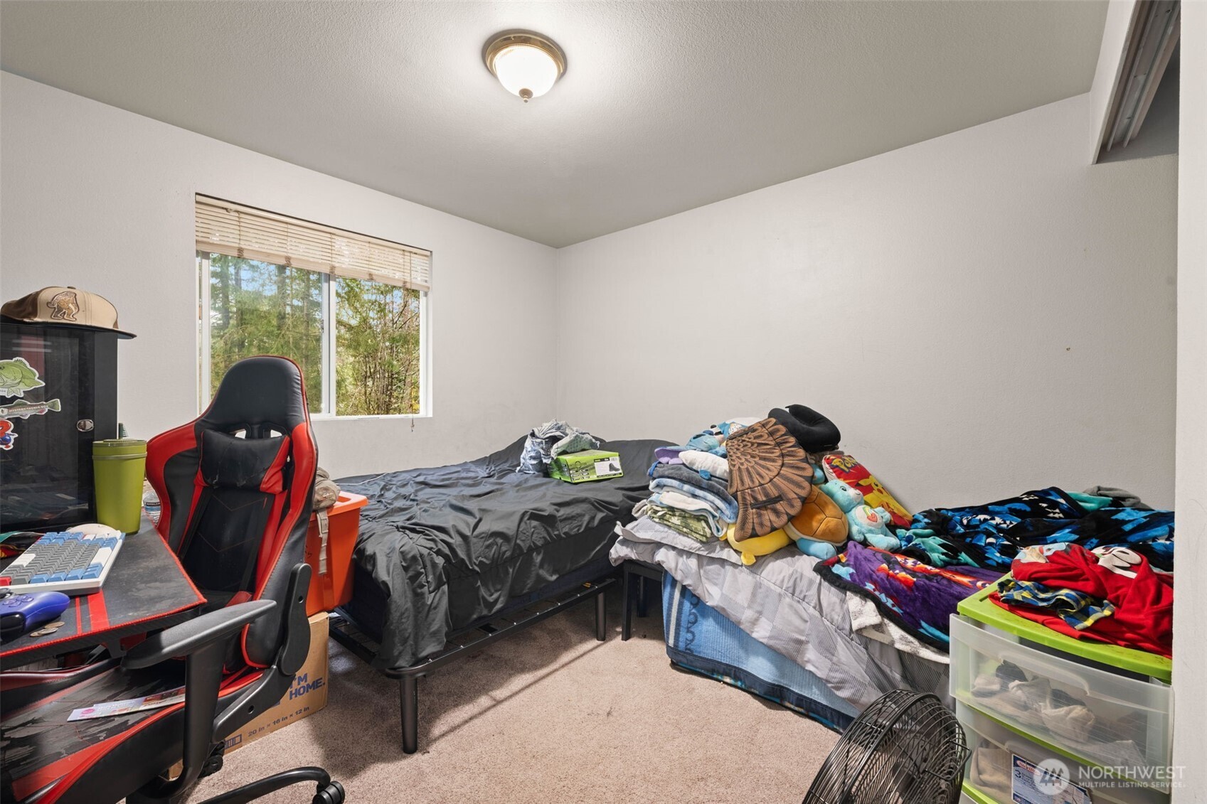 71 East Dunvegan Road Shelton, WA 98584 - Photo 10 of 21 a bed room with a bed and a window