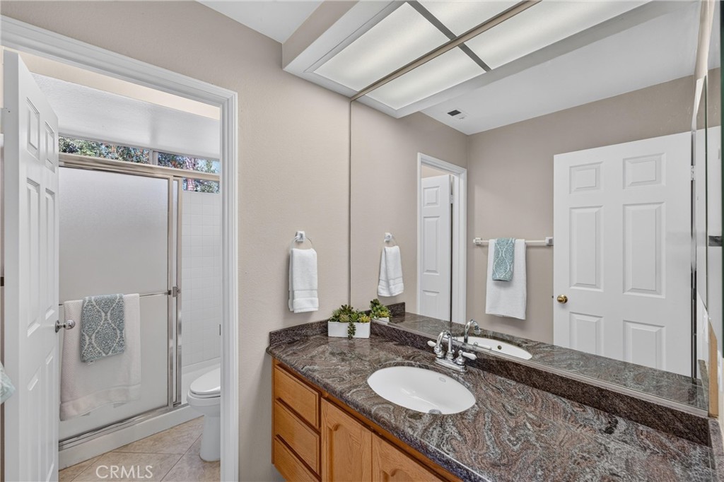 2000 Citrus Wood Lane Riverside, CA 92503 - Photo 10 of 51 Downstairs Bathroom with Shower. Conveniently located next to downstairs beddroom.