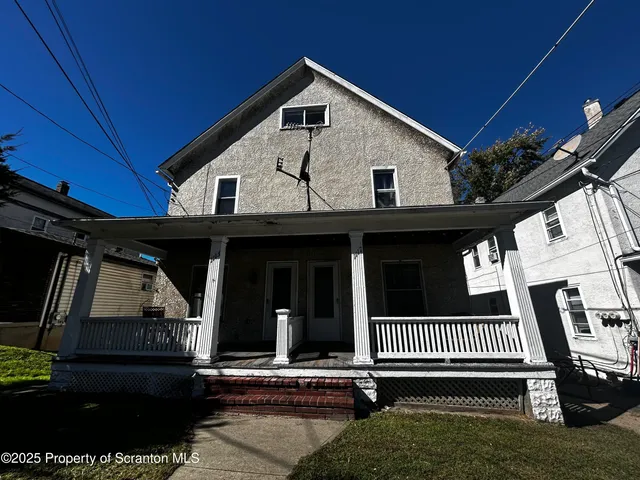 a view of a house with a deck