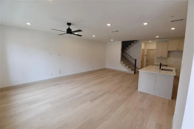 an empty room with kitchen appliances