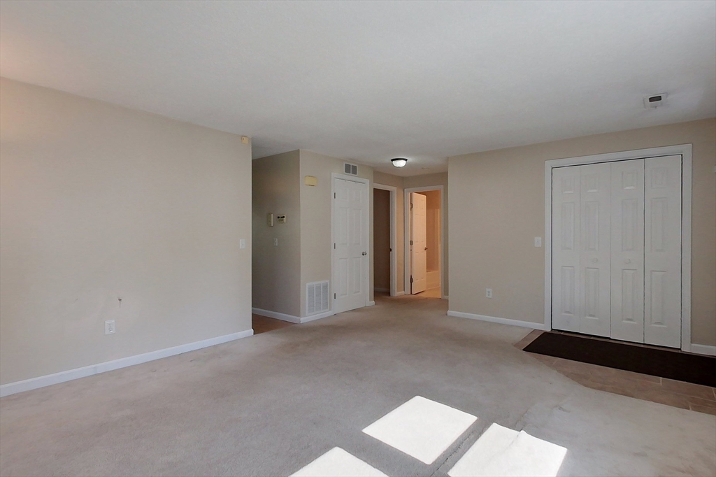 103 Main Street, Unit 10 Pepperell, MA 01463 - Photo 8 of 22 a view of an empty room