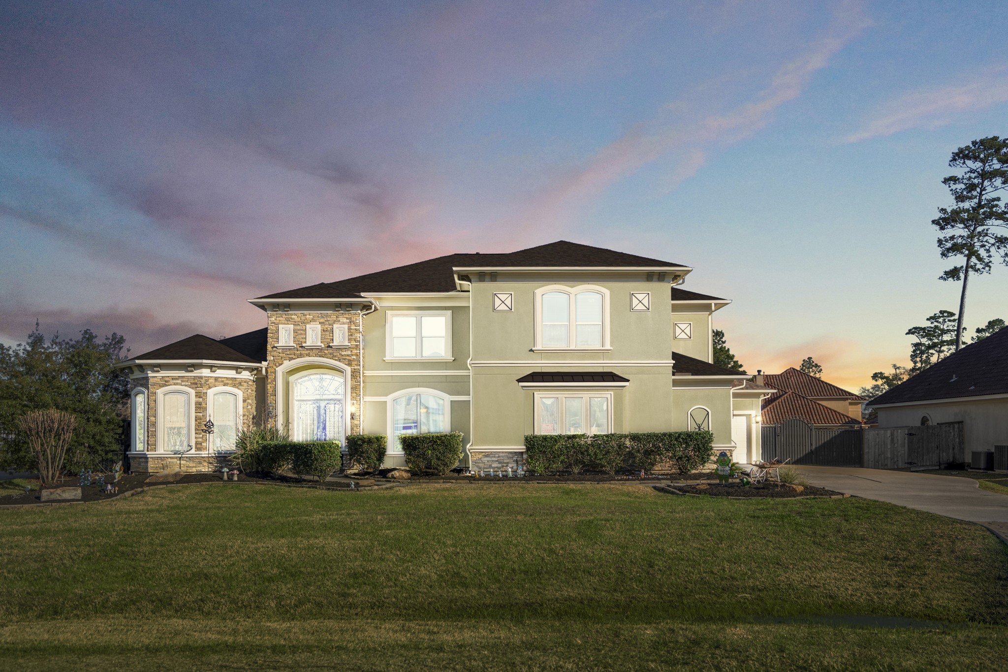 25606 Windy Isle Court Spring, TX 77389 - Photo 1 of 45 a front view of a house with a yard