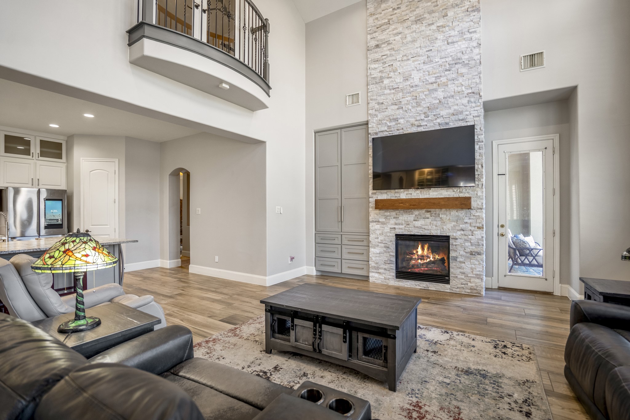 25606 Windy Isle Court Spring, TX 77389 - Photo 25 of 45 The beautifully custom cabinetry unit offers massive storage seamlessly blending functional organization with high-end interior design.