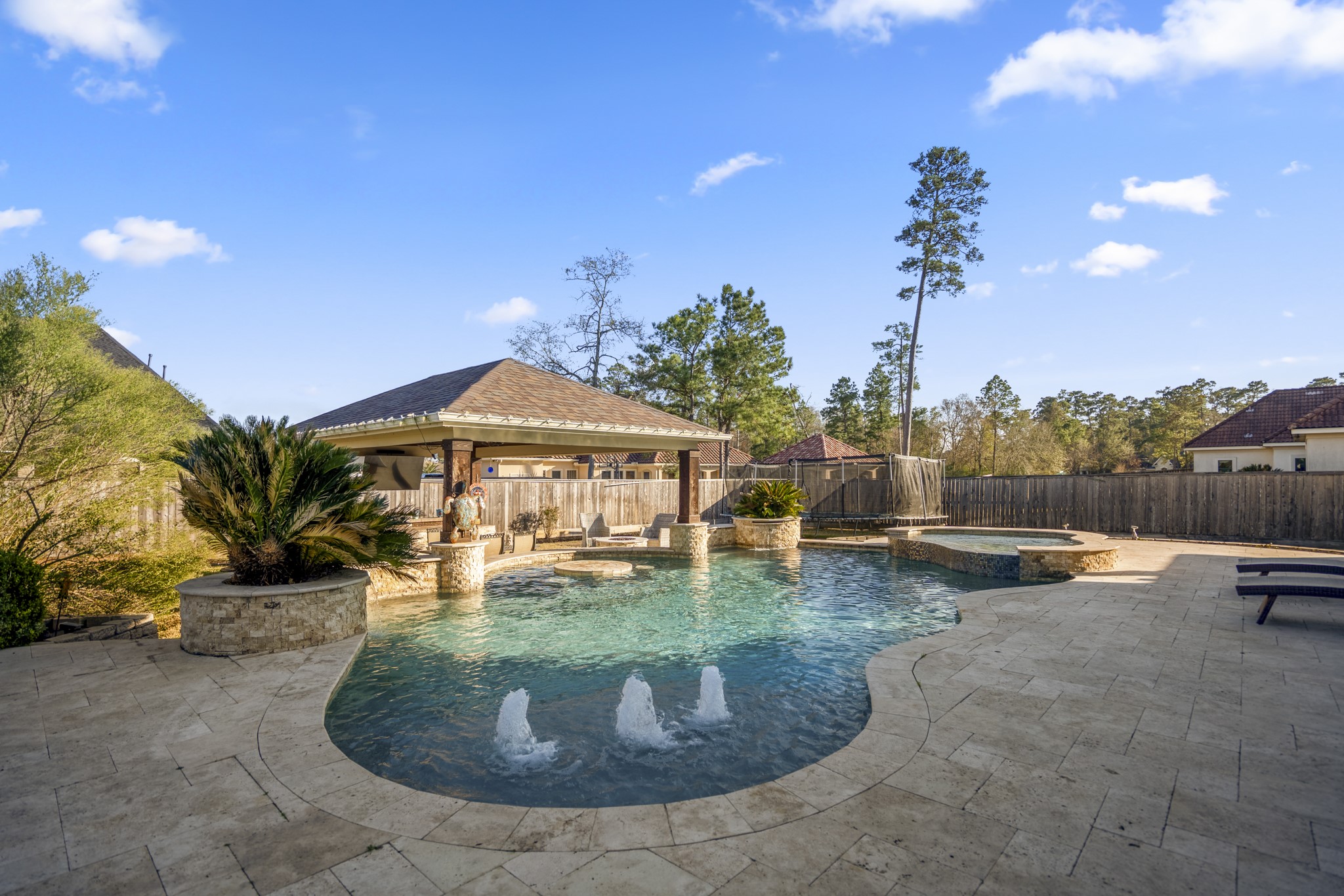 25606 Windy Isle Court Spring, TX 77389 - Photo 35 of 45 a view of a house with swimming pool and sitting area