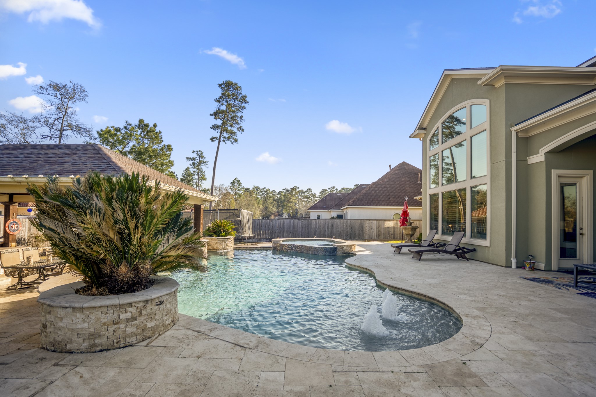 25606 Windy Isle Court Spring, TX 77389 - Photo 36 of 45 a view of a house with backyard and sitting area