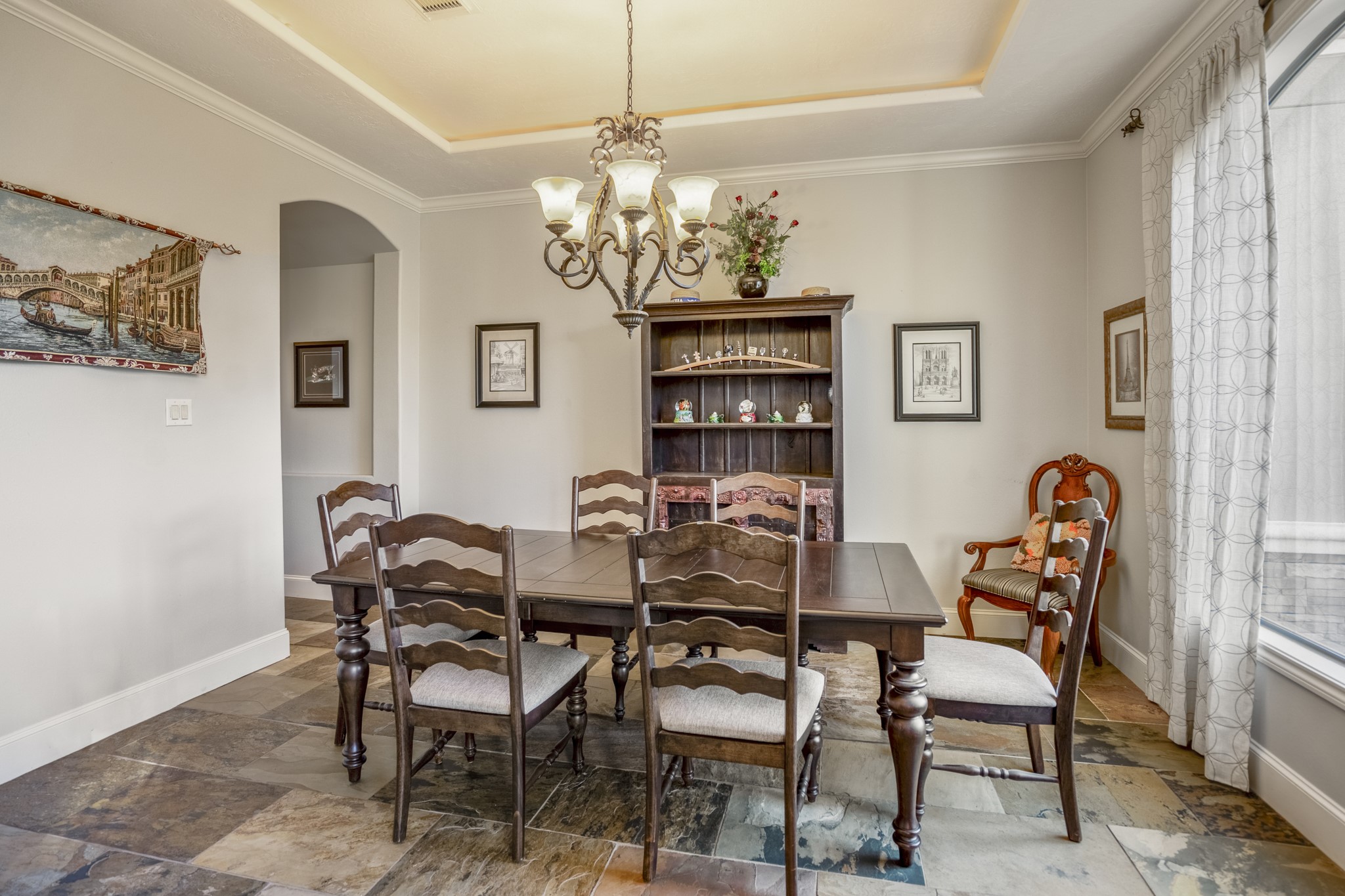 25606 Windy Isle Court Spring, TX 77389 - Photo 9 of 45 a view of a dining room with furniture and chandelier