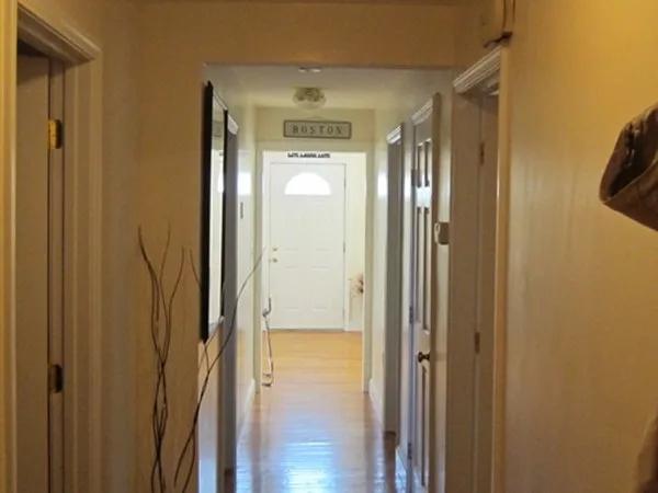 a view of a bathroom from a hallway