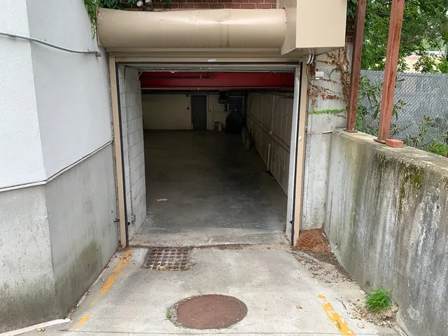 a view of a wooden door of the house