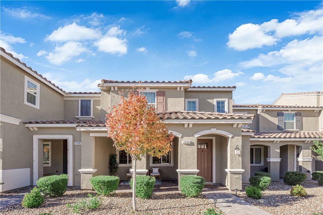 2606 Ercolano Street Henderson, NV 89044 - Photo 2 of 46 Welcome to this stunning 2024, 3 bed, 2 1/2 bath, 2 car garage like-new townhome located in InspiradaENERGY STAR® certified home is equipped w/smart thermostat, tankless water heater for energy efficiency.