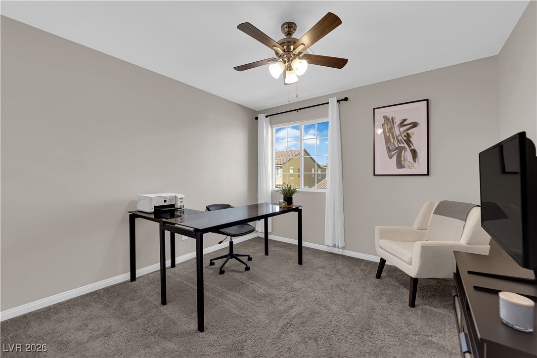 2606 Ercolano Street Henderson, NV 89044 - Photo 29 of 46 Bed 2 w/ceiling fan & light, two tone paint, curtains & closet.