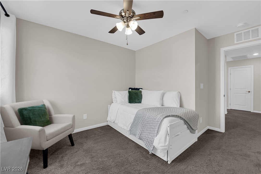 2606 Ercolano Street Henderson, NV 89044 - Photo 30 of 46 Bed 3 w/ceiling fan & light, two tone paint, curtains & closet.